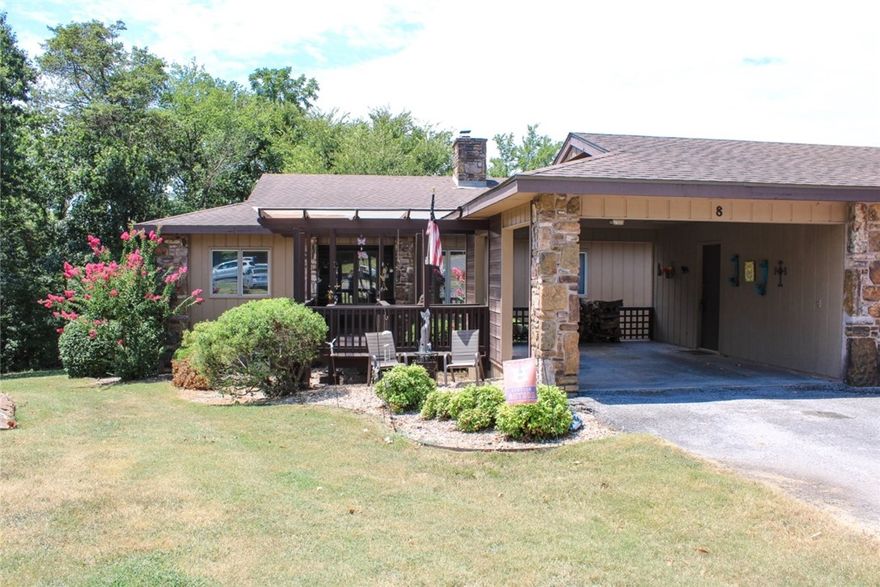 Well maintained 3 Bedrooms, 2 bath townhouse with an open floor plan with a cozy stone fireplace.  Eat in kitchen with a charming greenhouse window and formal dining. The split bedroom layout includes a private master suite, two additional bedrooms, and a second bedroom with direct access to a full bath. A full length deck is accessible from both the dining area and the master bedroom, creating an ideal space for relaxing or entertaining. This home feels inviting and is truly move in ready. The neighborhood includes a walking path that leads to the Lake Rayburn dam where you can enjoy fishing and swimming. Recent flooring upgrades add to the appeal. The seller is willing to include the refrigerator, washer, dryer, and other appliances with the sale.