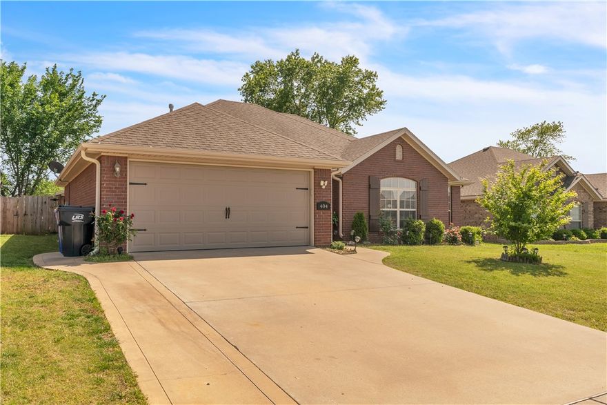 Welcome to this well-maintained 4-bedroom, 2-bathroom home just a short walk from Kirksey Middle School. Nestled in a well-established neighborhood, this home offers a smart, efficient layout. Inside, you will find a warm and inviting living space that maximizes its 1,501 sq ft with a practical floor plan designed for comfort and everyday living. The kitchen and dining areas flow nicely for easy mealtime gatherings, and he bedrooms provide flexible space for family, guests, or a home office. Recent upgrades - Epoxy-coated garage floor for a clean, durable finish. Garage door and WiFi-enabled motor for secure, remote access. Expanded covered back patio with a pergola - perfect for relaxing and entertaining outdoors, with two mature peach trees adding charm and seasonal fruit. Conveniently located close to shopping and restaurants. This home combines peaceful residential living with excellent accessibility. Don't miss your chance to see this move-in-ready gem-schedule your private showing today!