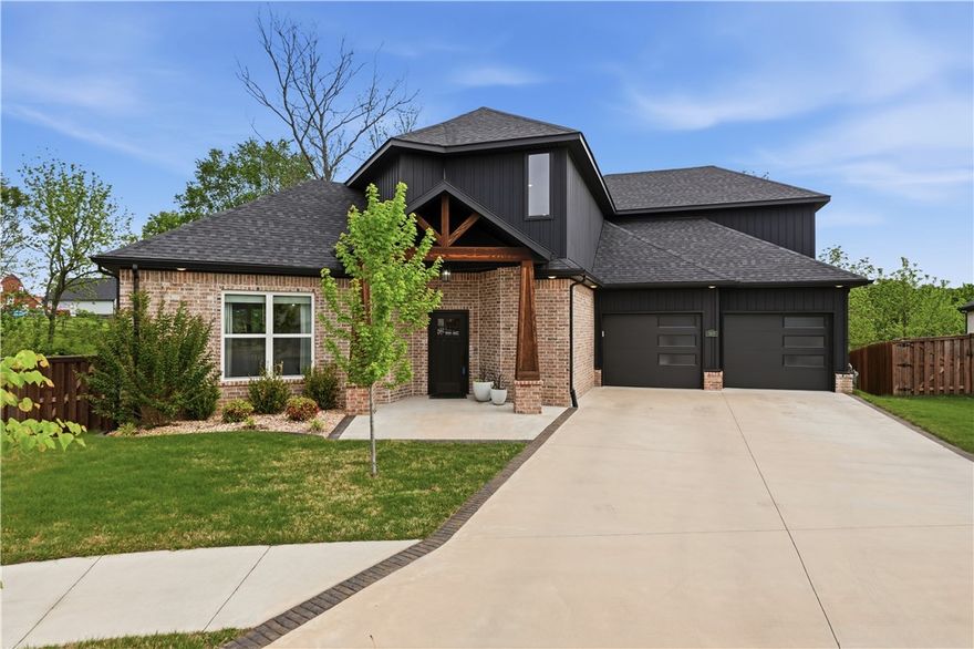 Location, Location! Within walking distance to Coler Creek bike & walking trails, Ardis Ann Middle School, Elm Tree Elementary School, and only 5-minute drive to Downtown Bentonville! High quality home with engineered hardwood floors, quartz countertops, custom cabinetry with soft close hinges & drawers, wired for surround sound, wireless security system, sprinkler system and garage is100% insulated. There is a large hidden pantry, tankless hot water heater, retractable central vac w/toe-kick in kitchen, and two living areas! Wood privacy fence around backyard and wonderful family friendly neighborhood. Better hurry on this one!