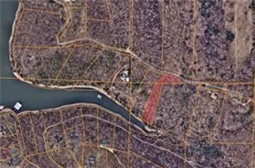 This nearly 1.5-acre lakefront lot offers the perfect setting to build your dream home. Enjoy tranquil lake views and the privacy of spacious land while still having easy access to electric and public water at the street. With plenty of room to create your ideal home, this property is ready for your vision to come to life.