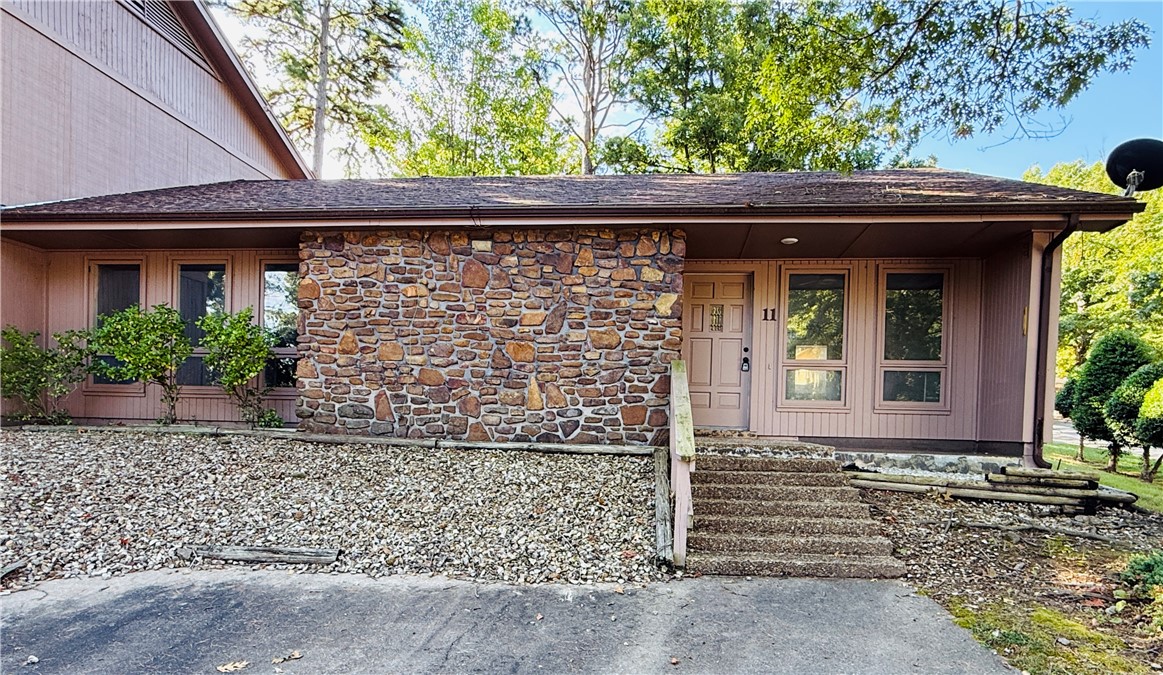 2 Br 1 1/2 Bath townhouse near Bella Vista Country Club. Fresh paint, new flooring, lots of updates throughout. End unit, fenced around concrete pad in back for privacy, to include a small storage shed. Easy access to Hwy 71and shopping. Unit is heated by radient heat in each room and cooled by central air. New dishwasher. Refrigerator, washer and dryer provided.