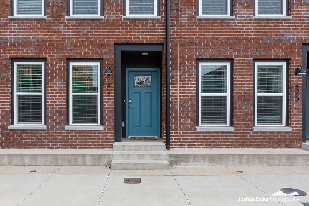 Incredible opportunity to live in Downtown Bentonville! 1 block from the Skylight Cinema and the HUB!! 1,600 sq ft of living space situated across 3 floors. Main level offers a bedroom, full bath, and garage access. Second level is open living to kitchen and dining room. Third floor is master suite with full bath, laundry, and a walk out balcony. Amenities included stainless steel appliances, gorgeous quartz counter tops, full tile surround showers, beautiful hardwood floors, 2ā faux wood blinds and even comes complete with washer, dryer, and refrigerator. 2 units are available for sale next to each other and come with a tenant.