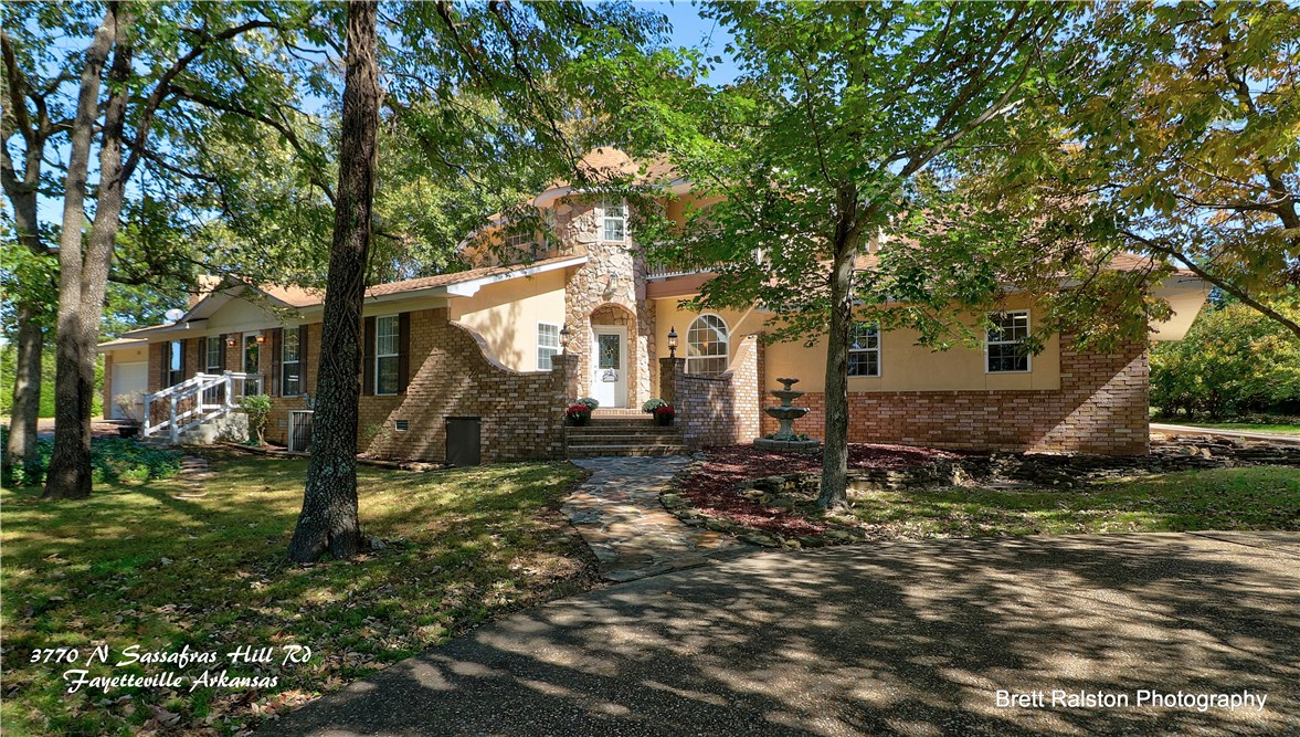 Beautiful home situated on a one-acre lot with pastoral views and lots of nice trees! House has been updated and is in pristine condition. Spacious layout works well for daily living or extended family with multiple living areas, two kitchens, lots of space and two separate entrances. Sitting room off master. There are also two separate garages. You can’t go wrong with this home.