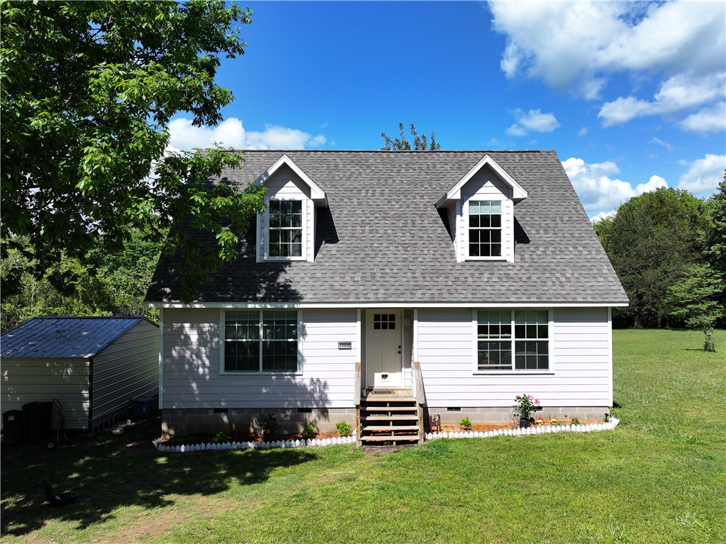 Location, location, location....This one acre country beauty is only 3 miles from Devil's Den State Park! This would be a great family home or vacation home for anyone that loves this serene area. This property is perfect for any nature lover. 3 bedrooms, 2 baths, 2 levels with primary being on the main level. Newly built covered back porch to enjoy all the views. This home even has RV parking with hookups. New roof in 2023! New 12x20 shed and new front porch steps. Homeowner is leaving all appliances, including the refrigerator and washer & dryer. Move in ready and ready to go!! Come see it today.