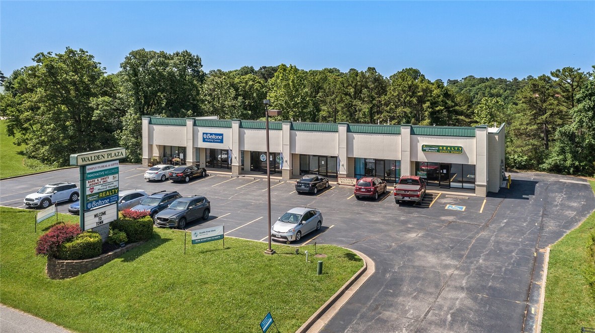 Investment opportunity with excellent visibility in Eureka Springs. This well-kept multi-tenant commercial building offers 11,700± SF across 8 units on 0.98 acres with major road frontage along Highway 62/Passion Play Road. Built in 1994, the property is on a concrete slab foundation with ample parking and utilities in place (electric, gas, public water/sewer).
Currently 100% occupied, the building produces a gross annual income of $79,500, with most units leased to medical and professional service tenants. Zoning allows for medical, dental, office, or retail uses, making this a versatile income-producing property in a strong location.Conveniently located minutes from downtown Eureka Springs and positioned on a high-traffic corridor, this property offers stable income and long-term investment potential.