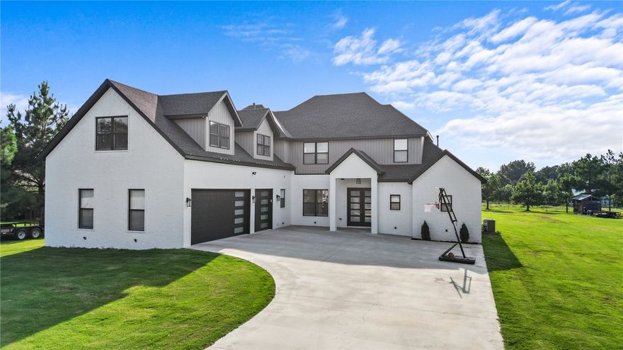 Beautiful home built in 2021 with 5 bedrooms, 3.5 bath sitting on gorgeous acre. Entry features a wide entry way viewing the beautiful split floor plan with lots of natural lighting, open layout of the gorgeous living room and kitchen, formal dining room to the left, kitchen with a center island, ample quartz countertops and cabinets. Master suite features beautiful shower, jacuzzi tub, dual vanity and spacious walk in closet. Upstairs features 2 bedrooms, with a media room, a bonus room with a wet bar and an office/study. Central vacuum throughout the house