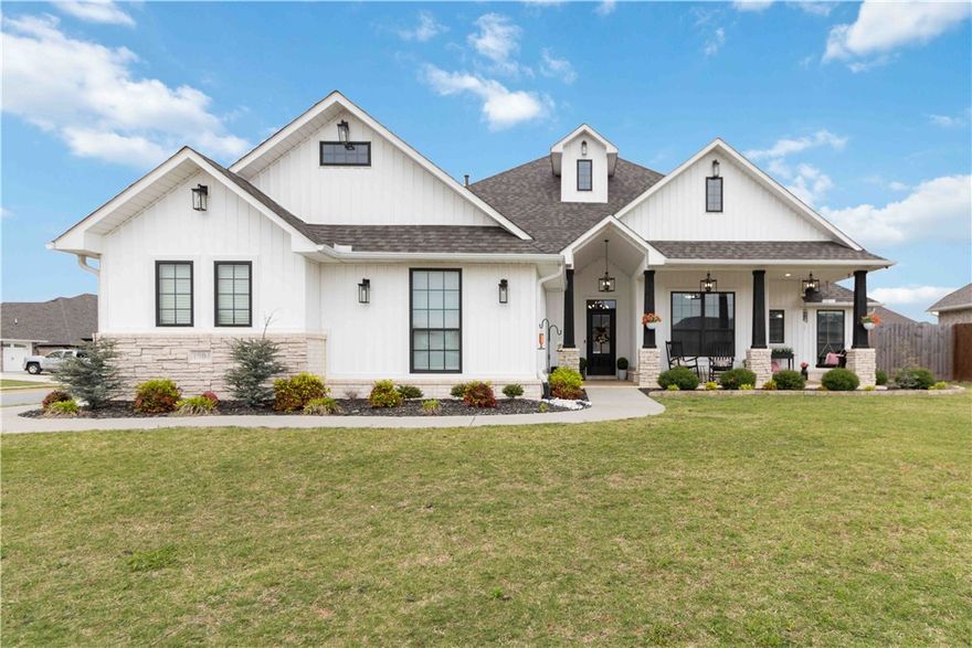 Beautiful 4-bedroom, 2.5-bath home on a spacious corner lot in Pea Ridge’s desirable Elkhorn subdivision. Built in 2022, it features an open layout with a gourmet kitchen, granite countertops, stainless appliances, and a large island. The living room offers a cozy fireplace and abundant natural light. The private primary suite includes a luxurious bath with dual vanities, soaking tub, and separate shower. Unique features include a built-in dog wash and epoxy-coated garage floors. Enjoy a large yard and convenient access to schools, parks, and local amenities.
