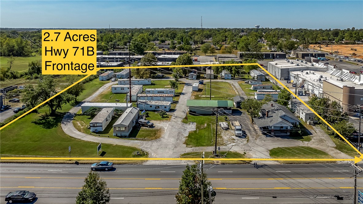 Active Mobile Home Park sitting on 2.7 PRIME flat acres on 71B with high traffic count. Income producing Mobile Home Park has 29 slips (24 with mobile homes, 5 vacant slips with all city utilities) plus the original 1245 SF homestead house and 40x50 workshop. Possibilities are endless in this location near downtown Rogers, I-49 and Beaver Lake. Call for details today!