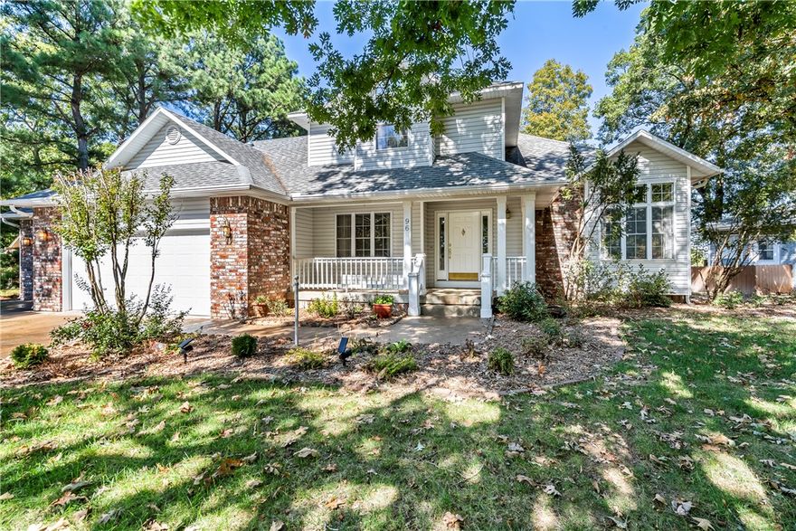 Turn-Key VRBO or primary residence on the Golf Course! This beautifully maintained 3-BR/2.5-BA home is currently a nightly rental. Recent major improvements include: 30-year architectural shingle roof, Trane dual-fuel, multi-stage heat pump system, Daikin mini-split heat pump in the sunroom, fresh interior paint, and refreshed exterior siding. The living room features a gas-log fireplace and a custom stained-glass window. The kitchen offers abundant storage and counter space, double electric ovens, and a gas Thermador cooktop. A master suite and bath are on the main floor, and two large bedrooms and a full bathroom are on the second floor. The sunroom and deck overlook the fairway and include a secluded hot tub, fire pit, and patio. A 4-car garage with a rear door for your golf cart is a plus. Easy drive to Eureka Springs, Roaring River State Park, Dogwood Canyon Nature Park, and Branson.