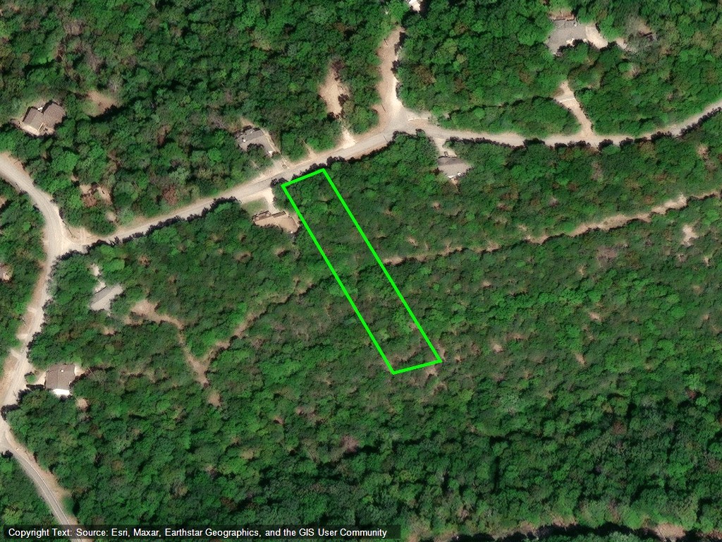 Nice parcel of land located in Unit 5 in Holiday Island. Has level area near the road and gentle slope towards the back of the property. Several nice areas to build a home. Wooded with a rectangular, Deep lot just under an acre(.838 ac). Close to Marina, lake access, golf course, Rec Center and all the other things Holiday Island has to offer. Contact me to schedule a showing.