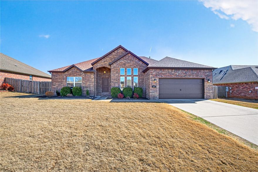 Looking for a gem in the heart of NWA? This is it! Just 11 minutes from the Pinnacle Hills area—home to premier shopping, dining, the Walmart AMP, and more—this beautiful 3 bed, 2 bath home blends sophisticated elegance with comfortable, practical living. Enjoy thoughtful extras like a screened-in patio with a fireplace, perfect for relaxing in every season. The split floor plan offers privacy, while the elegant dining room with coffered ceilings adds a refined touch. The open living space features a cozy fireplace and flows seamlessly into a spacious eat-in kitchen complete with granite countertops, stainless steel appliances, and a pantry. The primary suite is a true retreat, offering a spa-like bath and separate his-and-her closets.  Step outside to a level, spacious backyard with an additional open patio—ideal for entertaining! Located in the Rogers School District and minutes from Mt Hebron Park, XNA and I-49! A special Jeep lift in the garage adds even more value!  Don’t miss out on this move-in ready home!