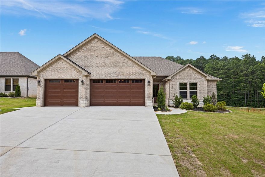 Currently under construction, photos are for information only—colors and finishes may vary.
Lot 12 on Elk Horn in Scenic Way Village is a spacious 2,219 square foot new construction home featuring 4 bedrooms, 2 bathrooms, and a 3-car garage. The open layout includes a large living room with a fireplace, a centrally located kitchen with a walk-in pantry, and a well-designed mudroom/utility area that connects directly to the primary suite’s walk-in closet. Each bedroom includes its own walk-in closet, offering ample storage throughout the home. Located just outside of town, Scenic Way Village provides the perfect blend of privacy and accessibility to parks, shopping, and downtown Russellville.
Plans are subject to change at the builder’s discretion.