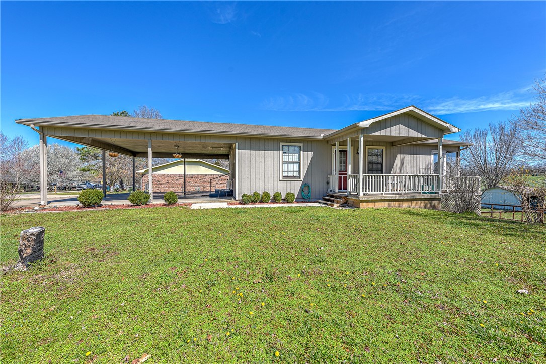 Beautiful views from your screened in porch. Country Living close to town. This wonderful 2 Bedroom 1.5 Bathroom house would be a perfect Starter Home, Retirement Home or Investment Property. This home sits on a spacious corner lot (Approx 1/2 acre). New AC/Heating unit February 2021
Please provide Prequal Letter of Proof of Funds with offer