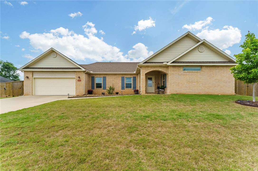 Beautiful home in quiet neighborhood features 3 bedrooms and 2 1/2 baths. Close to NWA cities, within 15-20 minutes from both the Bentonville square and the Rogers Pinnacle Promenade.
Light and airy open floor plan with a large kitchen island, granite countertops, and stainless steel appliances. Matching raised-panel cabinets can be found in the kitchen, each bathroom, and even the pantry.
The expansive living room has wood flooring, 9ft ceilings, and a gas log fireplace.
Owner’s suite boasts a large walk-in shower with glass door and a spacious walk-in closet with built-ins for storage and organization.
The back of the home feels like an oasis with its massive covered screened-in porch looking out to a peaceful lawn with a wood privacy fence. The newer 8x12 storage shed conveys with the home.
Frigidaire refrigerator located in garage will be offered to convey.