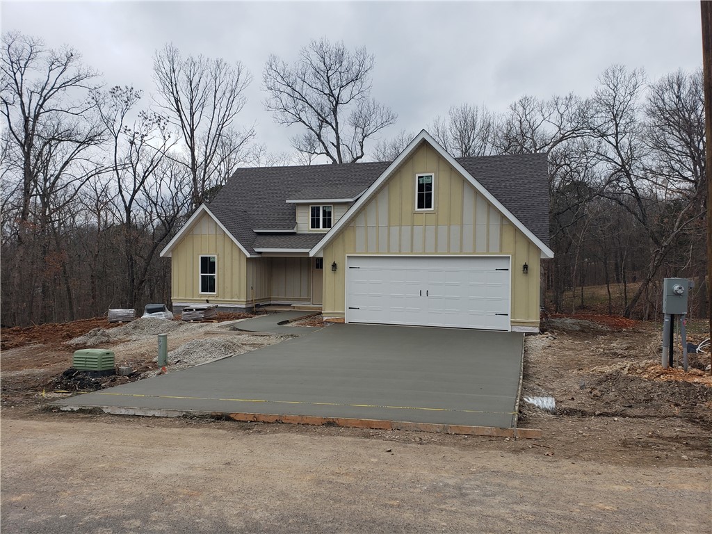 Beautiful new construction on .30 acre lot with a large covered deck on the back. Home features stainless steel appliances, laundry room with sink, wood flooring in family room, hall and master, walk in closets, pantry and more! Schedule your showing today!