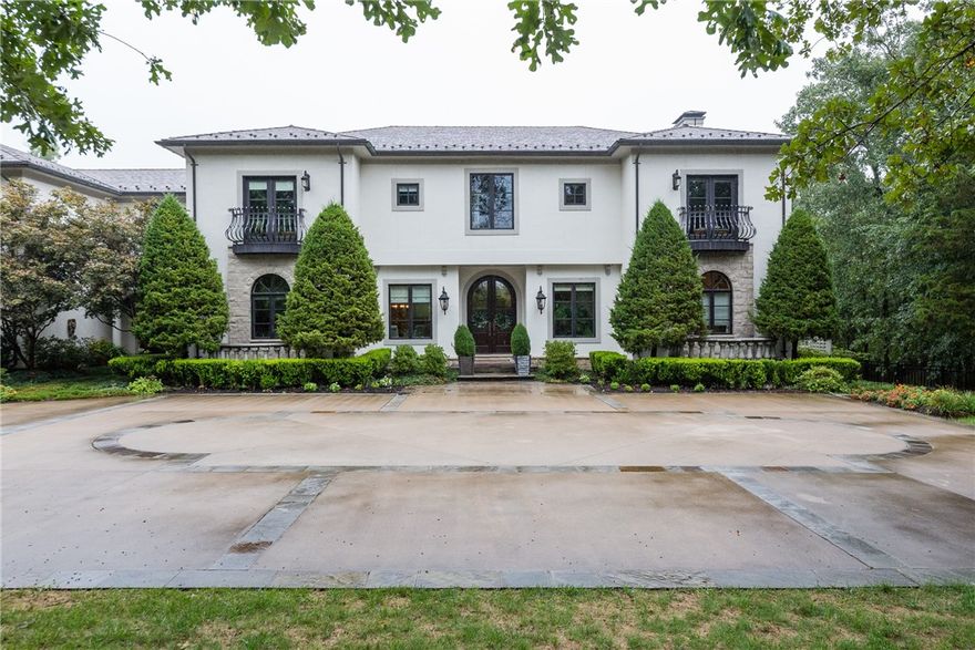 Luxurious East Fayetteville Estate Home situated on 5.66 Acres. Private resort like, professionally landscaped backyard, with Luther Stem salt water pool, fountains, lovely patios, hot tub, sauna, and cabana. 7164sq/ft, 5 bedroom, 5.5 bathroom, 2 Bonus Rooms, Office with sitting area and private entrance. Tons of storage including large cedar lined closet. Hardwood floors throughout, built-ins, French doors. Well appointed kitchen with large gas stove, double oven, warming drawer, microwave, & ice maker. Exercise room, screened in-porch, extra storage throughout. Professionally landscaped treelined entrance, wrought iron fence, & gorgeous flowerbeds, new deck. Truly must see!!