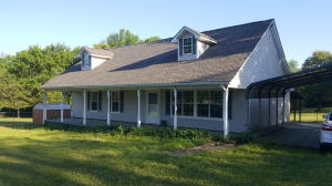 Newly Remodeled 3 Bedroom 2 Bath home, new roof, hardwood floors, carpet & paint, open floor plan. Large porch on front and back of the home!