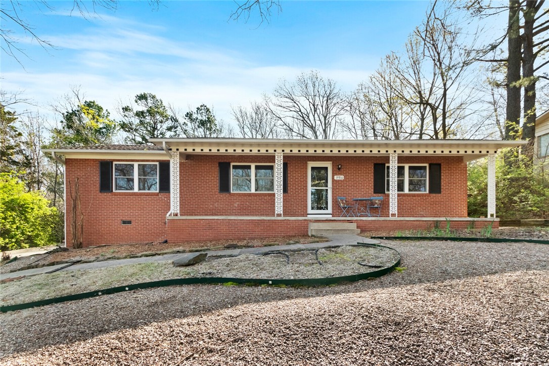 Charming home near Mount Sequoyah! Sought after location walkable distance to Root Elementary School and seconds from Mission and Crossover. This 3 bedroom, 2 bath home features a gorgeous front porch view, mature landscape, wood burning fireplace, backyard fire pit, and spacious garden. You don't want to miss this opportunity to live on the mountain!