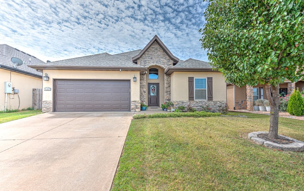 Charming Single Story Home! Ideal location. This 3-bedroom, 2 bathroom offers both comfort and convenience with a thoughtful layout and inviting living space throughout. The well-appointed kitchen includes granite countertops, upgraded backsplash, gas range, custom wood cabinets w/glass doors, gas fireplace in living area, EE appliances and tray & vaulted ceilings. The primary suite is a true retreat with a walk-in closet and beautiful ceramic tile shower. Outside privacy fence and covered patio, two car garage and storm shelter. Easy access to Veterans Park, Downtown Rogers, Rogers schools, all shopping and dining. Enjoy all the charm Rogers has to offer and make this property standout!