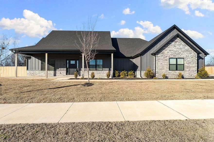 Luxury Meets Acreage in Stephanie Estates! This rare 1-acre estate perfectly blends sophisticated design with wide-open space. A standout for truck owners, the 850 sq ft oversized 3-car garage is deep enough to house a workshop and full-size vehicles like a Truck, Tahoe, Traverse, or Ford Explorer with ease.

The interior radiates quality, anchored by a gourmet kitchen with custom dark oak cabinetry, a bespoke range hood, granite countertops, and a large pantry. A smart split floor plan ensures privacy, keeping the three guest rooms separate from the primary wing. The primary suite is a retreat of convenience, featuring a soaker tub and a massive walk-in closet with direct access to the laundry room.

Outside, the flat, private backyard is fully enclosed by wood privacy fencing, offering a secluded sanctuary for gardening or play. From the high-end custom finishes to the sprawling level lot, this move-in-ready home offers a lifestyle of unparalleled character.