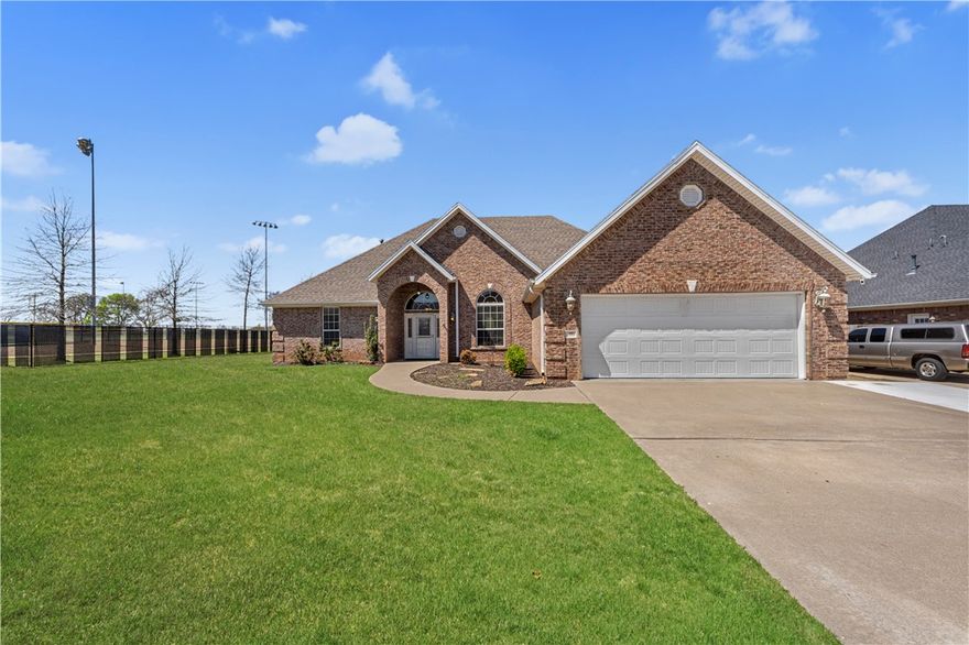 Location, Location, Location! Nestled on a quiet cul-de-sac and adjacent to a public park, this home offers both privacy and extra parking—plus it's walkable to Farmington High School! Enjoy stunning views of the Boston Mountains and experience the best of the Ozarks right from your doorstep.
This hard-to-find, carpet free, layout features four spacious bedrooms, a formal dining room, and a breakfast nook in the kitchen—perfect for everyday living and entertaining. The oversized primary suite offers plenty of space for a cozy reading nook or a home office, all bathed in natural light. Step into the high-end three-seasons room and out to a well maintained backyard. Major updates in the past four years include a new HVAC system, roof, gutters, water heater, and a privacy fence, making this home move-in ready and low-maintenance.