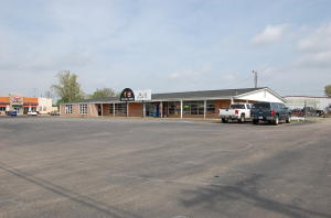 Prime commercial location on East main with 1.7acres of ground. 243' of frontage along East Main(Hwy 64) with 10,000 sq ft existing building. Lots of opportunities with this amount of land located on Main as well as this amount of square footage. Last traffic count shows 24,000 per day!