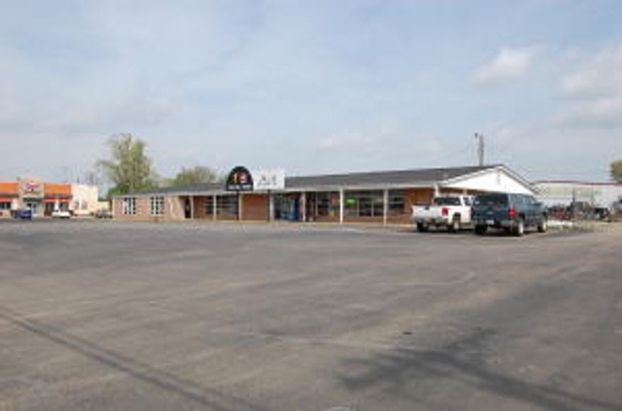 Prime commercial location on East main with 1.7acres of ground.  243' of frontage along East Main(Hwy 64) with 10,000 sq ft existing building.  Lots of opportunities with this amount of land located on Main as well as this amount of square footage.  Last traffic count shows 24,000 per day!