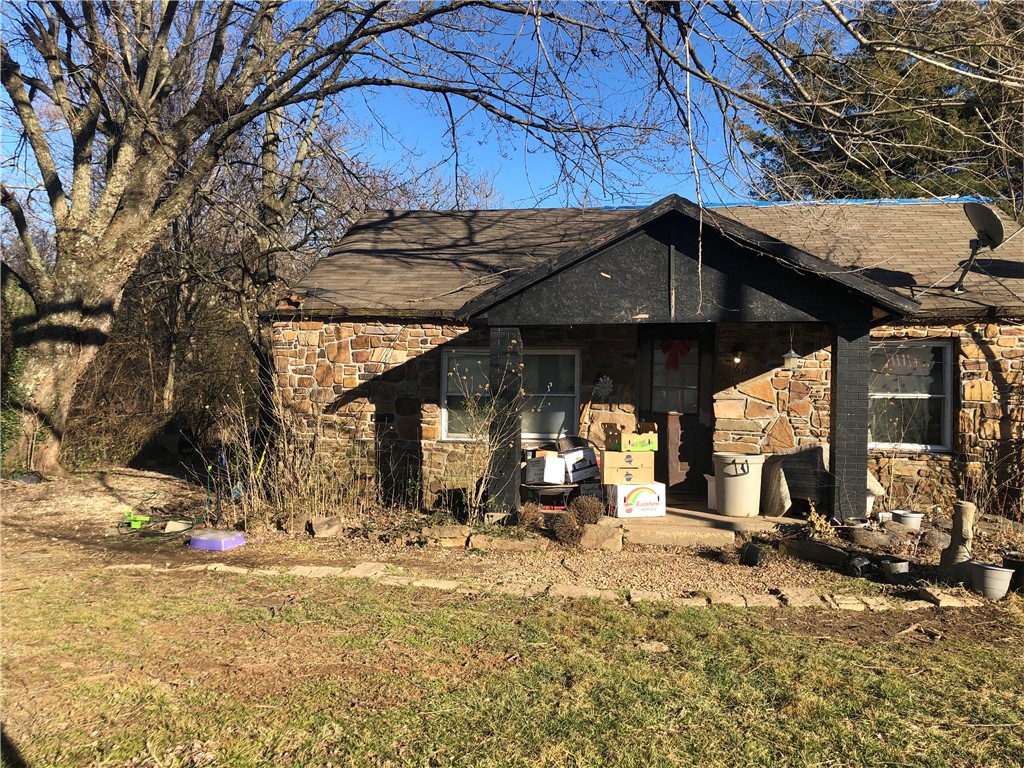 1 full acre across from school with water, electric & septic. Most or all of the value is in the land. Agent owned