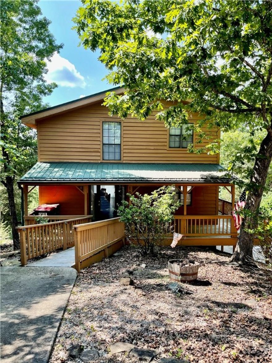Beautiful lake house on Beaver Lake with a view of Sailboat cove. Newly remodeled interior throughout. Private 2 slip Dock. Low corp line makes it easier to maintain the grounds and keep the view of the lake.