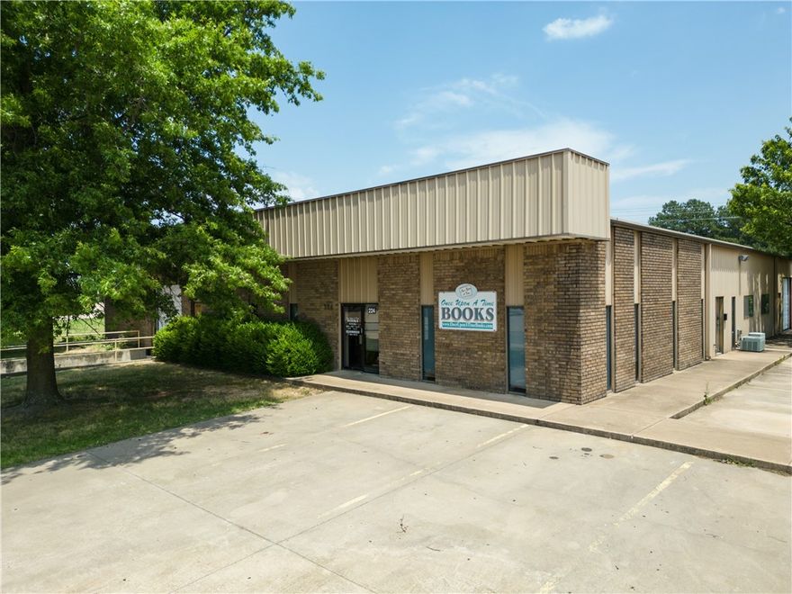 Large warehouse with 10% of it being office space and 2 baths.  2 overhead doors with one having a truck dock. Sits on one acre in an expanding area of Tontitown just off of Hwy 412. Access recently opened to Hwy 112 and Fletcher Avenue