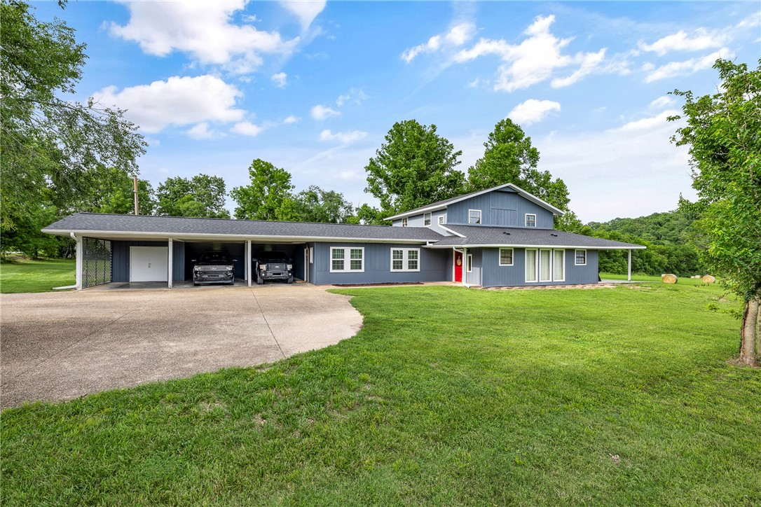 Rare opportunity to own a peaceful slice of Northwest Arkansas! This serene 1.5-acre property offers privacy, a stunning view, and unbeatable convenience to all things NWA. Whether you're looking for land to enjoy or a place to build your dream, this one delivers. Located near popular bike trails, itās perfect for outdoor enthusiasts. The existing home is a spacious, sprawling ranch with six bedrooms and four bathroomsāideal for hosting, growing, or simply spreading out. A truly special place to start your next chapter and make lasting memories.