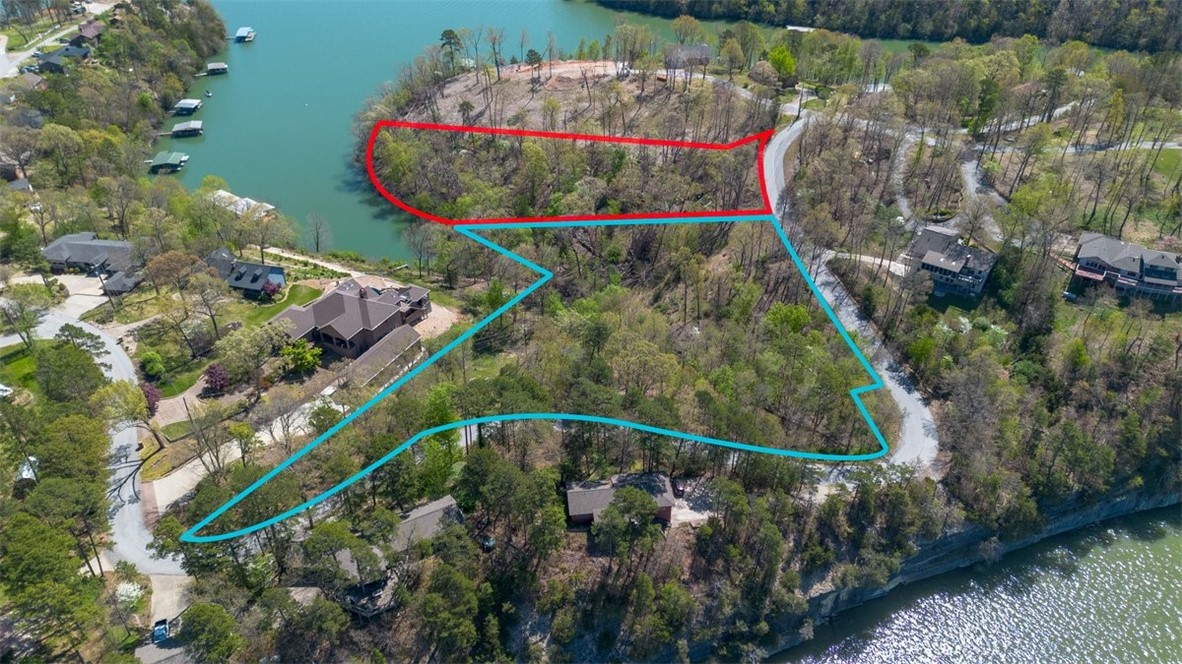 Fantastic opportunity to own a 4.23-acre double lot on Beaver Lake that is only 13 minutes from Rogers. This lot is in the Oak Bluff Summit neighborhood & would make the perfect location for your dream home. This lot is spacious, wooded, private, quiet & easy to get to, with Public Water/electricity at the street, you would need a septic system. Lot is in a private, deep cove that offers nice views, close to HWY 12 Bridge/boat launch ramp, between Prairie Creek & Rocky Branch Marinas if you wanted to lease a boat slip. There is a 20' Trail Easement Per Plat, Benton County File#L201921700, that goes between lots 3A & 3B & Ingress-Egress Access Easement up by Rivercliff Road. Public water/electricity at street, buyer to verify taxes, water, utilities & deed restrictions.