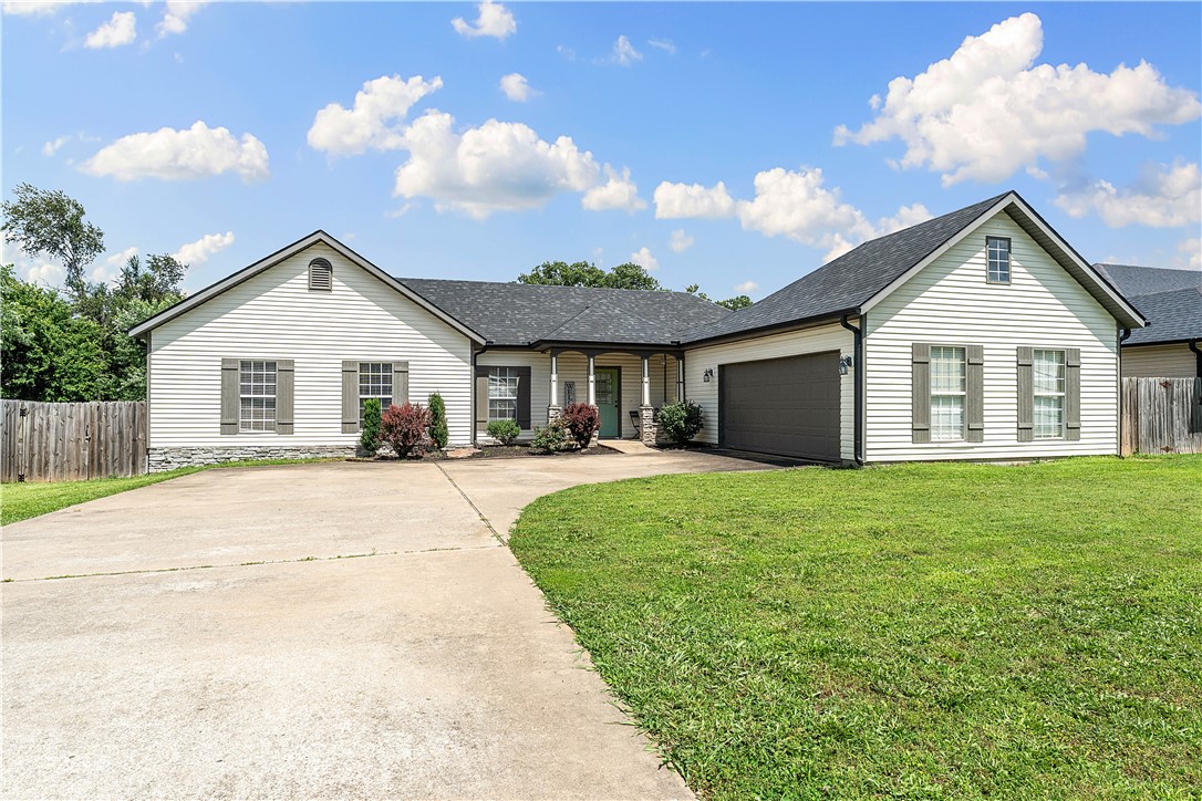 Welcome home to comfort and charm! This gem offers wonderful curb appeal, a thoughtful layout, and a cozy atmosphere that makes you feel at ease the moment you step inside. Nestled on a peaceful street among neighbors, yet just one minute from E Centerton Blvd, you’ll enjoy easy access to I-49 and all that Northwest Arkansas has to offer. Inside, natural light fills the spacious living area, creating a welcoming space to relax or gather with loved ones. The kitchen features ample cabinetry, sleek concrete countertops, and a cozy dining nook. With the split floor plan, each bedroom offers its own sense of privacy, while the primary suite provides a peaceful retreat with its own private bath! This home is waiting to be yours—come see for yourself and imagine the possibilities! Walk through video offered upon request