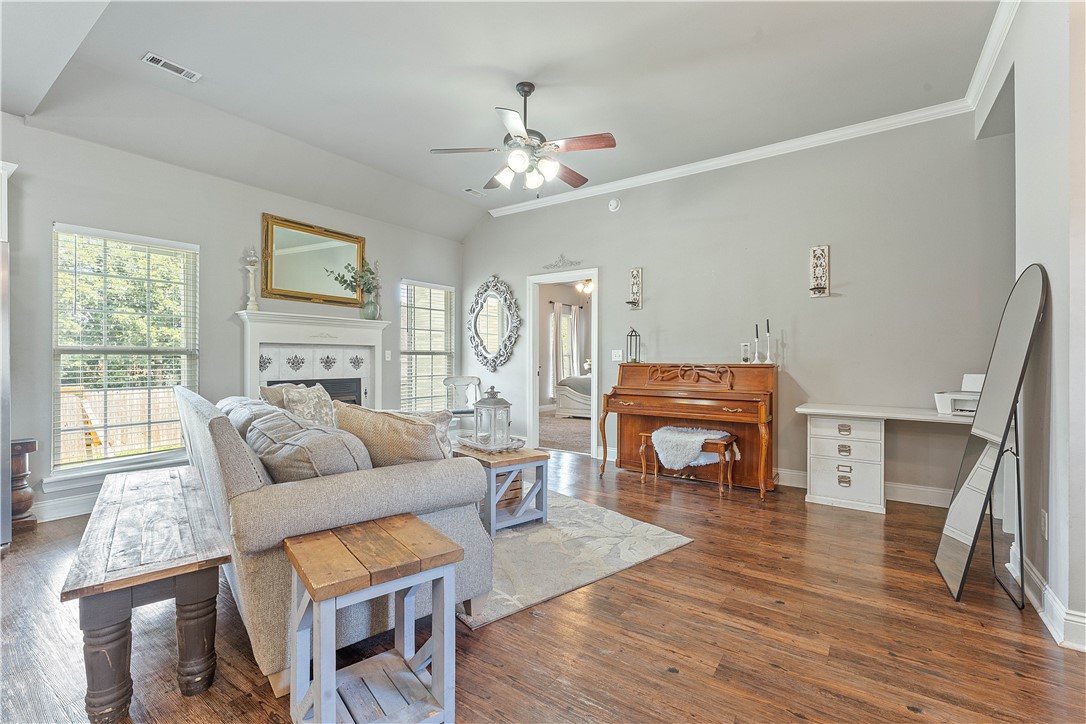 Welcome home to comfort and charm! This gem offers wonderful curb appeal, a thoughtful layout, and a cozy atmosphere that makes you feel at ease the moment you step inside. Nestled on a peaceful street among neighbors, yet just one minute from E Centerton Blvd, you’ll enjoy easy access to I-49 and all that Northwest Arkansas has to offer. Inside, natural light fills the spacious living area, creating a welcoming space to relax or gather with loved ones. The kitchen features ample cabinetry, sleek concrete countertops, and a cozy dining nook. With the split floor plan, each bedroom offers its own sense of privacy, while the primary suite provides a peaceful retreat with its own private bath! This home is waiting to be yours—come see for yourself and imagine the possibilities! Walk through video offered upon request