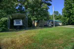 INVESTORS - FIRST TIME HOMEBUYERS.....This might be the one you've been looking for! Located a few miles outside of Morrilton, this ADORABLE and AFFORABLE quaint home features 864 SF, two spacious bedrooms, one full bath that features a new tub/shower insert as well as a semi open kitchen and living room. Metal roof, some new flooring throughout and TWO BONUSES.....the 10'x16' wooden shed with a 8'x15' lean-to as well as the 18'x30'x14' metal carport. So many options and possibilities with this property!