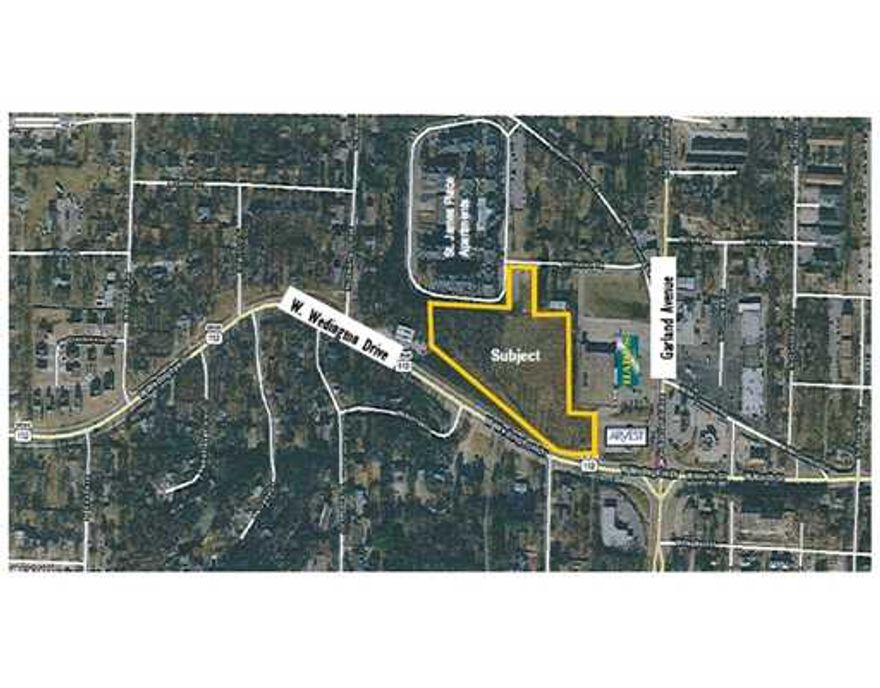 0.2± miles to the University of Arkansas.  Prime Student Housing Development Site.  Zoned CS (Community Services).  Current UofA Enrollment 26,000± students.