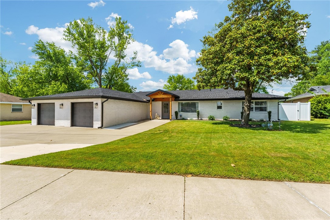 Experience the best of Northwest Arkansas living! Just 3 minutes from vibrant Downtown Rogers, this beautifully updated 4-bedroom, 2.5-bath home offers the perfect blend of modern style, comfort, and location. Set on a spacious lot with mature trees, a large backyard, and gated RV/boat parking, this home offers rare appeal. Outdoor enthusiasts will love the direct access to the Frisco Trail, connecting to the Razorback Greenway. 5 minutes from Lake Atalanta’s mountain biking trails and parks, 7 minutes to the nearest Beaver Lake boat ramp, and only 10 minutes to Pinnacle Hills Promenade and I-49. Inside, enjoy thoughtfully updated finishes including an electric fireplace, living room built-ins, and generous storage throughout. The secluded primary suite is a true retreat with a double shower, dual vanities, and a dedicated makeup station. New vinyl privacy fence and deck installed in 2024, new roof and full remodel 2022. Perfect place for those seeking outdoor adventure and elevated comfort!