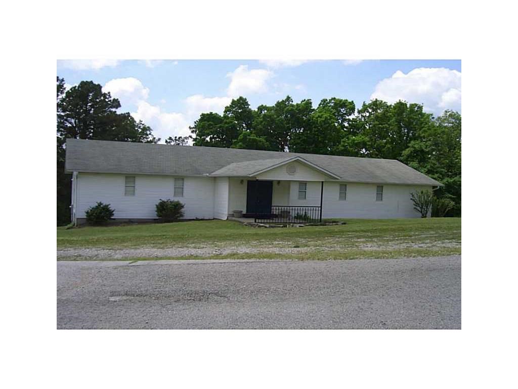 This church building has main church sanctuary complete with pews and PA system. Also upstairs is with large kitchen and dining/meeting hall. Downstairs has 2nd kitchen and 3 meeting rooms. Parking available across frontage of property.