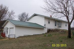 Price reduced on this cute 2 bedroom house on 1 & 1/2 corner lot. Good neighborhood. Beauty salon currently in basement but would make a great 3rd bedroom with full bath and laundry room. Could be a mother-in-law quarters. Downstairs fully plumbed and heated. Owner will consider any reasonable offer.