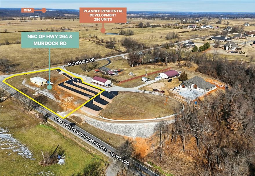 Prime commercial land opportunity at the NEC of Hwy 264 & Murdock Rd in rapidly growing Cave Springs. This ±1.3 usable acre site boasts high visibility with ±407 ft of frontage on Hwy 264, a key arterial with 12,000 VPD. Zoned C-2 with utilities on-site, it's ideally positioned adjacent to a planned 296-unit residential development. Excellent potential for retail, office, or service-oriented businesses to capitalize on the area's projected 12.5% population growth.