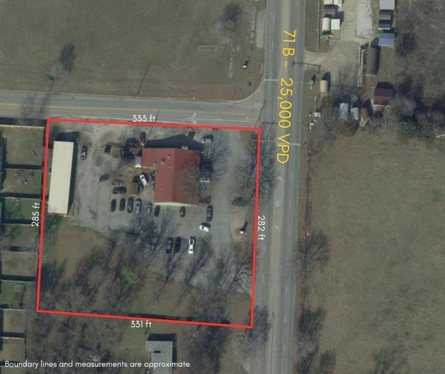 2.14+/- acres available in the heart of Springdale on a hard corner of 71B with traffic lights. MAJOR ROAD FRONTAGE. Both buildings are tenant occupied and have been for many years. Great development opportunity.