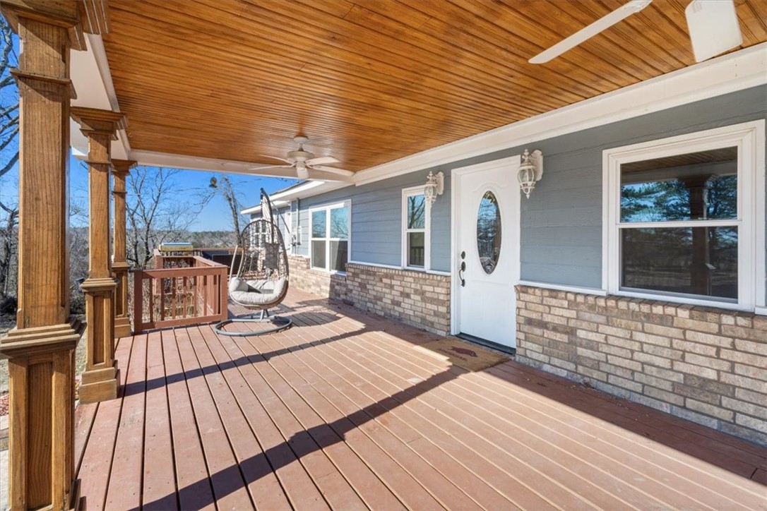 Move-in ready and completely remodeled, this stunning home on 5 acres combines modern comfort with country charm, located just 3 minutes from I-49. Enjoy peace of mind with updates that include a new roof (2017), HVAC system (2019), energy-efficient windows, new brick and siding, granite countertops, stainless steel appliances, fresh paint, and plush carpet (2022). The thoughtfully designed split floor plan offers three spacious living areas, a bright eat-in kitchen, and a versatile cellar for extra storage.
Outside, 2,300 square feet of outbuildings provide endless possibilities for hobbies, storage, or a workshop. Relax on the inviting front porch while taking in the serene views of fruit trees and the tranquil countryside. This home is the perfect blend of style, functionality, and location. Donāt miss outāschedule your private showing today!