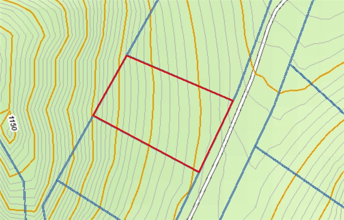 Gradually sloping lot in an area with high end homes