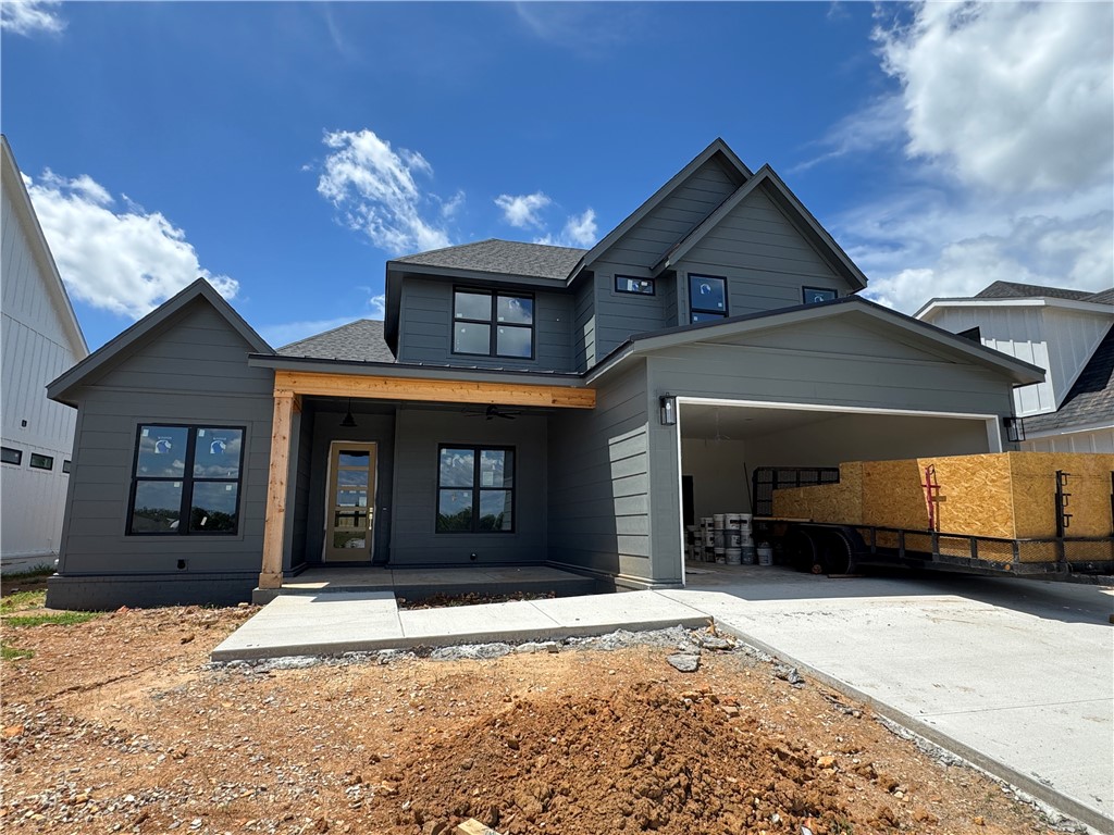 Welcome to Meadow Brook in SW Rogers! Great community in the best location! This plan features 3-4 bedrooms (2 flex spaces either bedroom 2 or study option as well as upstairs bedroom 4 or bonus room). All bedrooms have walk-in closets with plenty of storage! Downstairs you will find the primary bedroom. Great layout with open kitchen/living room area. Kitchen has large island to sit up to 6 bar stools, built-in gas cook top, built-in oven and microwave, large pantry, and eat in dining area. Primary bedroom feature en suite bathroom with soaking tub, walk-in shower, his and hers separate vanities, and large closet with lots of built-ins. Bedrooms 3 & 4/bonus room are upstairs along with a full bathroom. Enjoy the evenings grilling on the covered back patio! Can't beat location being only minutes to shopping, dining, groceries stores, and only steps to the Razorback Greenway Trail.