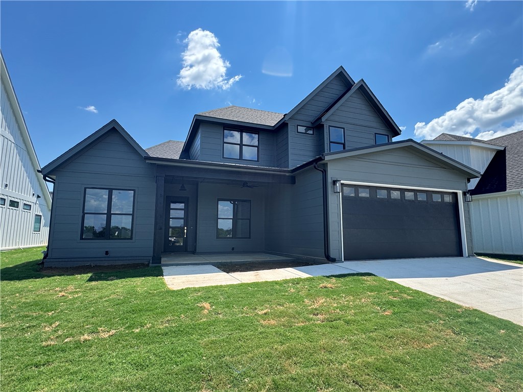 Welcome to Meadow Brook in SW Rogers! Great community in the best location! This plan features 3-4 bedrooms (2 flex spaces either bedroom 2 or study option as well as upstairs bedroom 4 or bonus room). All bedrooms have walk-in closets with plenty of storage! Downstairs you will find the primary bedroom. Great layout with open kitchen/living room area. Kitchen has large island to sit up to 6 bar stools, built-in gas cook top, built-in oven and microwave, large pantry, and eat in dining area. Primary bedroom feature en suite bathroom with soaking tub, walk-in shower, his and hers separate vanities, and large closet with lots of built-ins. Bedrooms 3 & 4/bonus room are upstairs along with a full bathroom. Enjoy the evenings grilling on the covered back patio! Can't beat location being only minutes to shopping, dining, groceries stores, and only steps to the Razorback Greenway Trail.