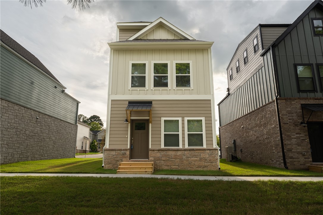 Brand new 2 BR/2 BA townhomes in south Fayetteville located close to U of A, Baum-Walker Stadium, The Ramble, Razorback Greenway, I-49, and all of Fayetteville's downtown area. This beautiful home features luxury vinyl plank throughout. The primary bedroom, kitchen and living area are on second level with the second bedroom and utility room on the first level. Kitchen has a pantry and both bedrooms have walk-in closets. Tub/shower combos in both baths. Third floor loft provides flex space. 2 car garage. Agent owned.