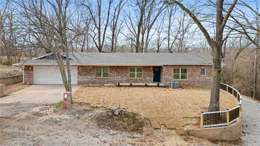 **Spacious 4-Bedroom 2872 Sqft Home on 1.32 Serene Acres in Rogers with two Bonus Rooms**
A rare cul-de-sac property offering space, privacy, and versatility. Set on 1.32 peaceful acres surrounded by nature, this home is ideal for flexible living, multi-generational households, or investment use. The layout includes 4 rooms on the main level and 2 downstairs, plus kitchens on both floors for convenience or rental potential. One entire level can be converted into a mother-in-law suite and is a great fit for Airbnb. The downstairs wide space offers room for a media room, gym, studio, or added living area. The expansive lot provides endless possibilities—gardens, outdoor entertainment, workshop, guest house, or recreation. Enjoy the peaceful setting while staying minutes from top Rogers amenities, schools, trails, shopping, and future growth areas, making this property a strong long-term investment. Home is conveniently located near downtown Rogers, where plenty of exciting activities attractions happening year-round