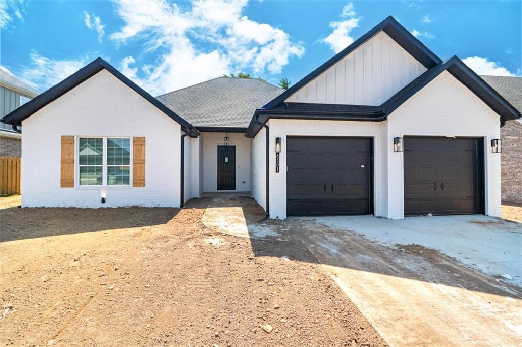 Located in the highly sought after SW Rogers subdivision, The Ivey's. Close to everything NWA has to offer: restaurants, shopping, entertainment, parks & more. Some features include a gas fireplace, solid surface flooring in the living areas, ceramic tile in the wet areas, carpet in the bedrooms, granite counters through out, stainless appliance package, covered back porch with wiring for cable, and plumbed for gas grill, cellulose insulation, low e windows, insulated garage doors, gas water heater, privacy fenced back yard, full gutters, 2" faux wood blinds, and more.
