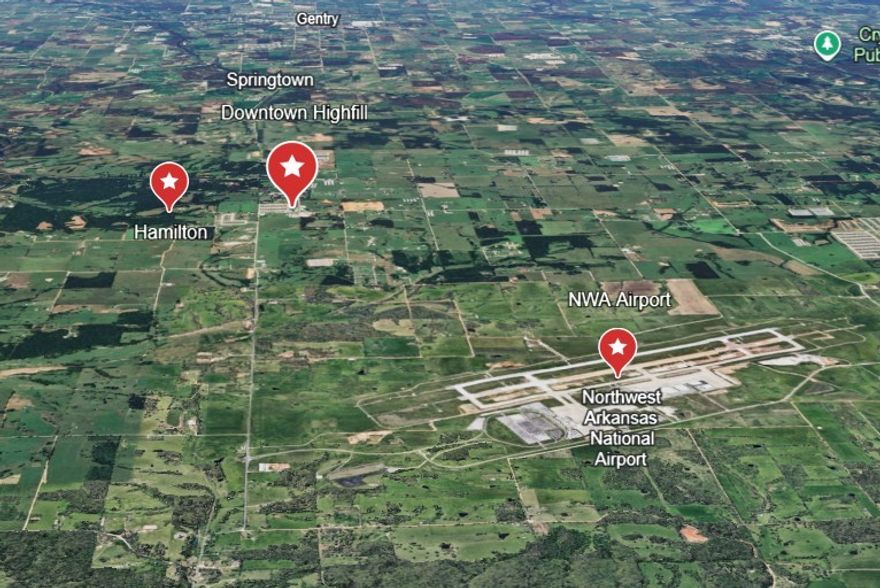 Prime Investment Opportunity – Nearly 20 Acres in Highfill/Gentry, AR! Located less than half a mile from the rapidly growing town of Highfill and just 3 miles from Northwest Arkansas National Airport, this property offers outstanding potential for development, income, pasture, timber, or long-term investment. A natural spring and creek run through the land year-round, electric is already on-site, and water is available at the street—making this a rare find in a high-growth area. Approximately a 1600 sqft Shop on the property with no value given.