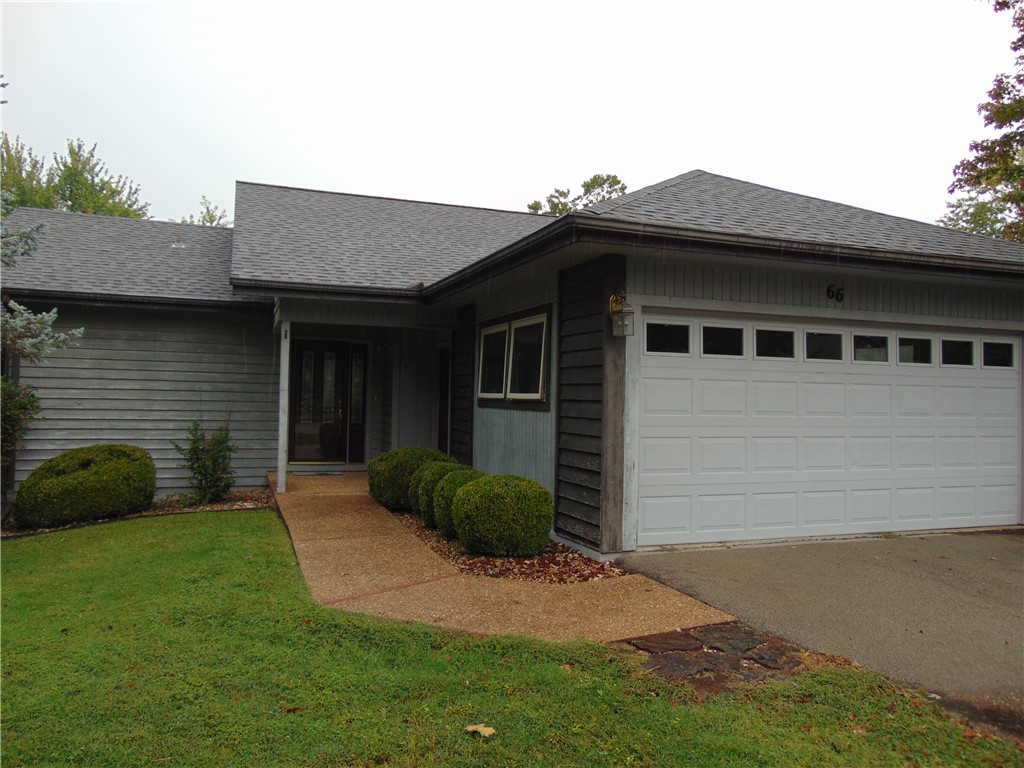 Move in ready townhome with single car garage. Located on the 8th tee box on Brittany golf course. Split bedroom plan. Large sunroom with gas log, free standing fireplace.